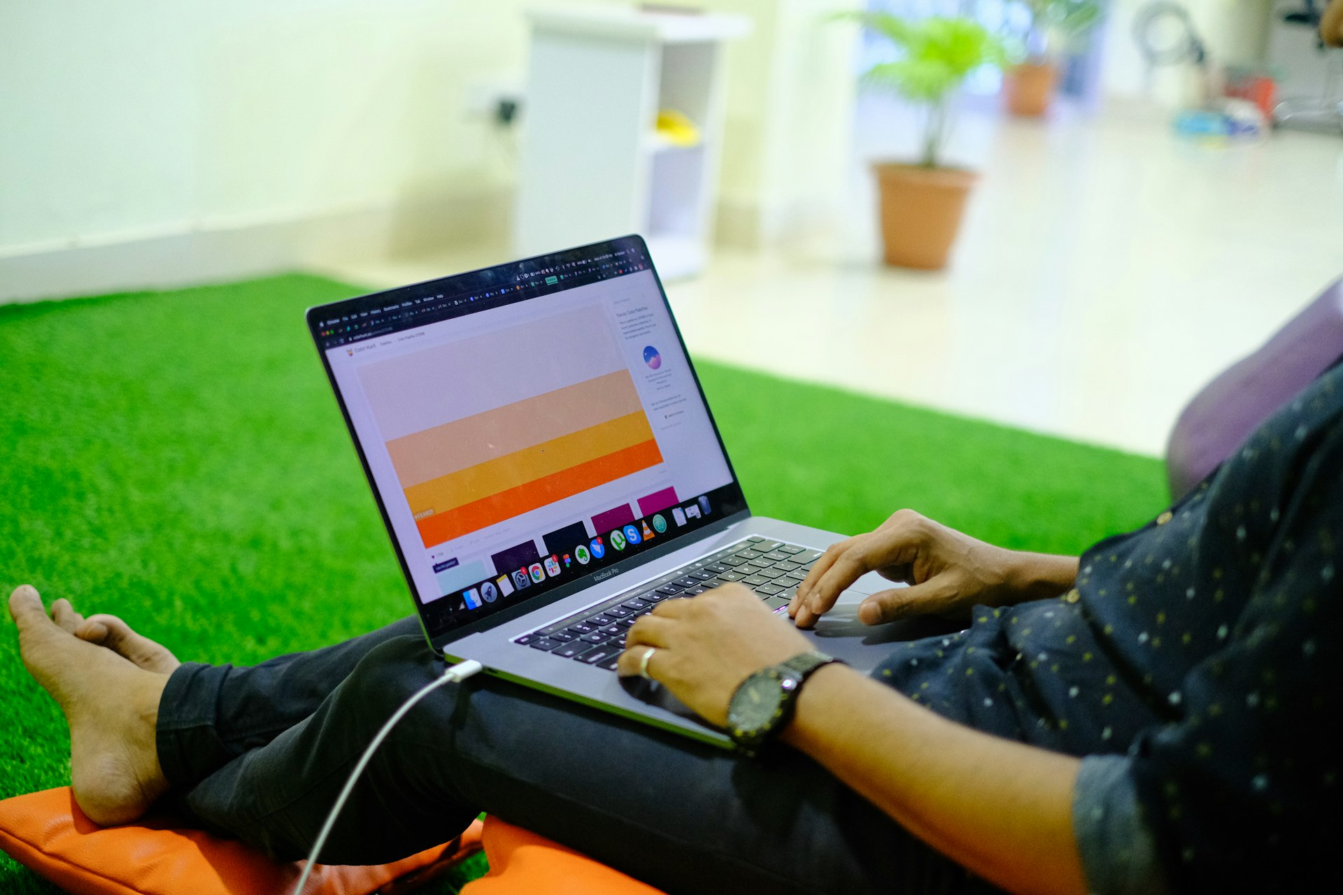 person using black and silver laptop computer